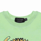 Dettaglio scollo t-shirt bambino stampa leone
